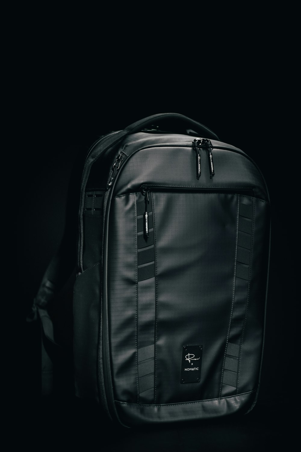 black and gray the north face backpack