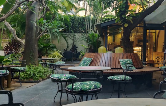 brown wooden table with chairs and chairs in Pondicherry India