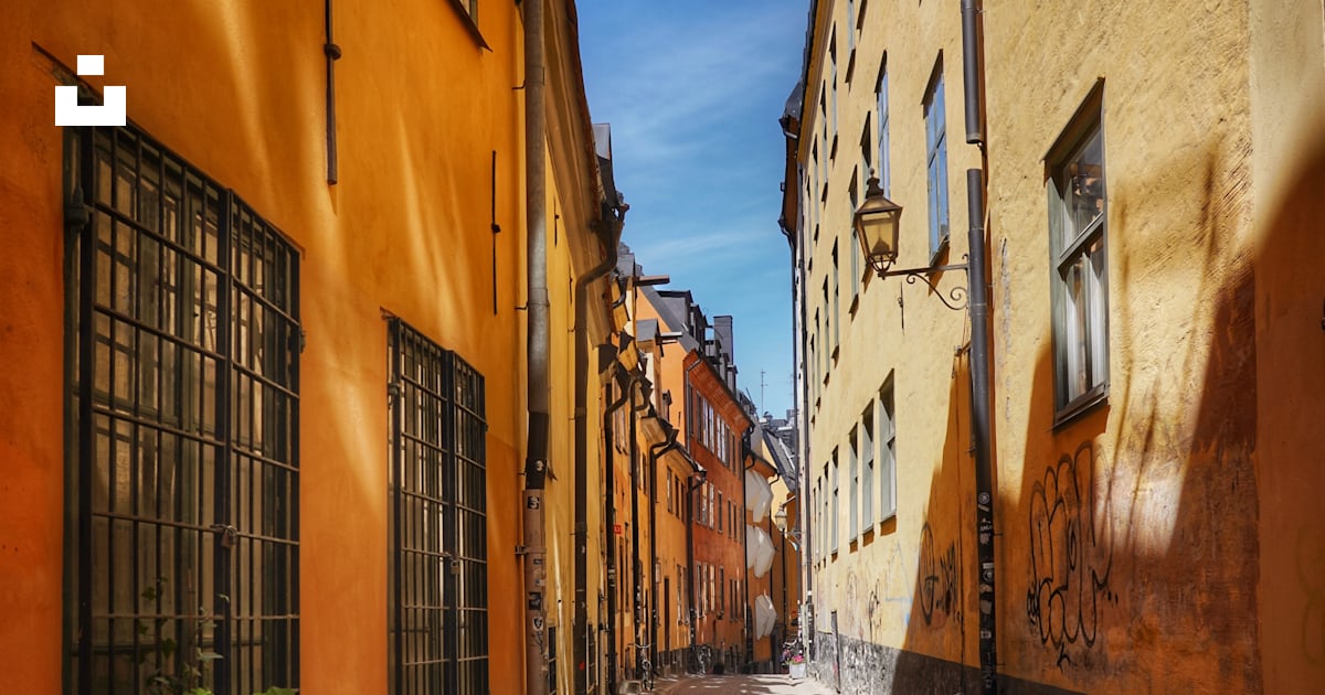 Empty road between concrete buildings during daytime photo – Free Gamla ...