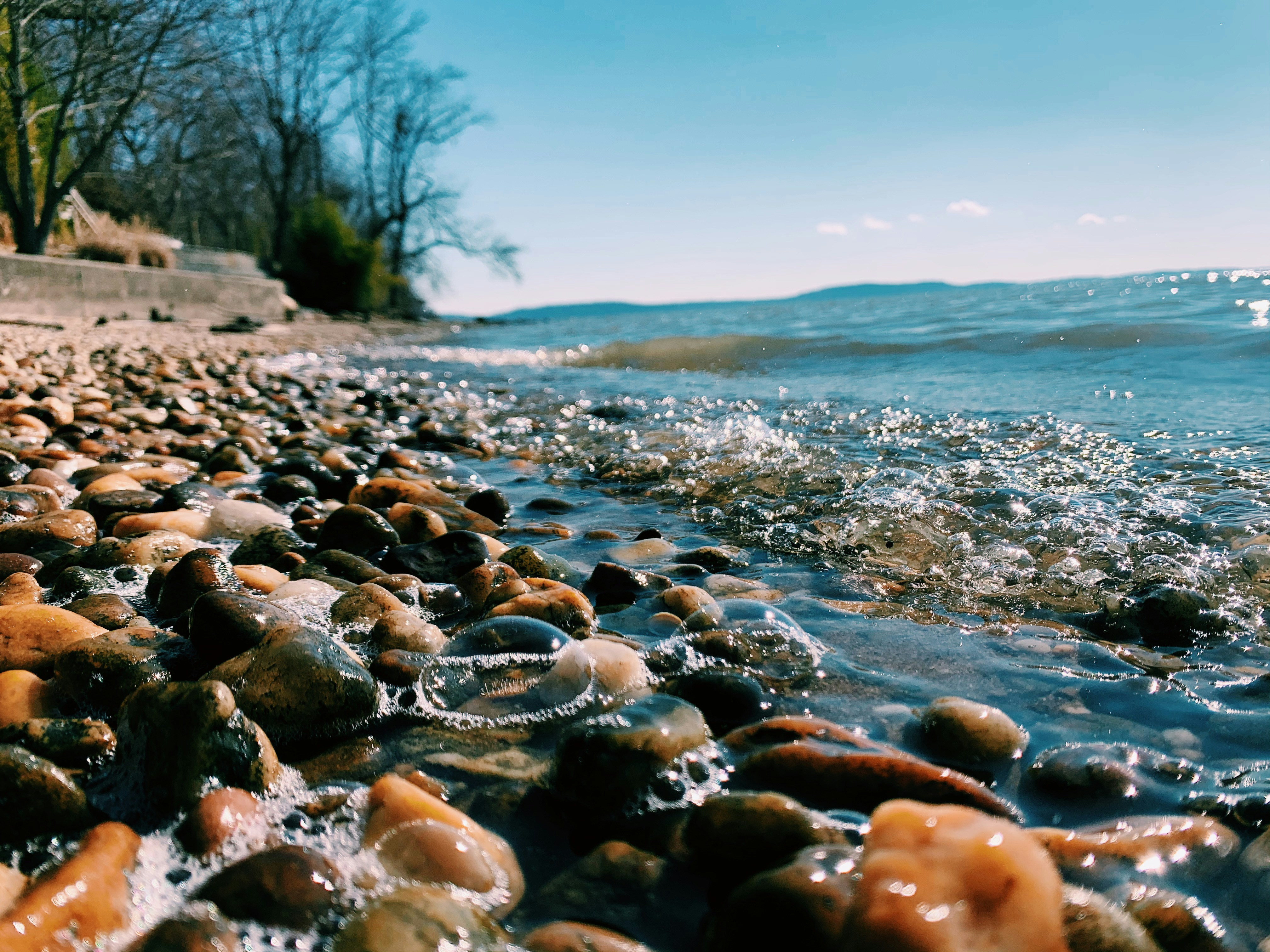 brown and gray stones on seashore during daytime