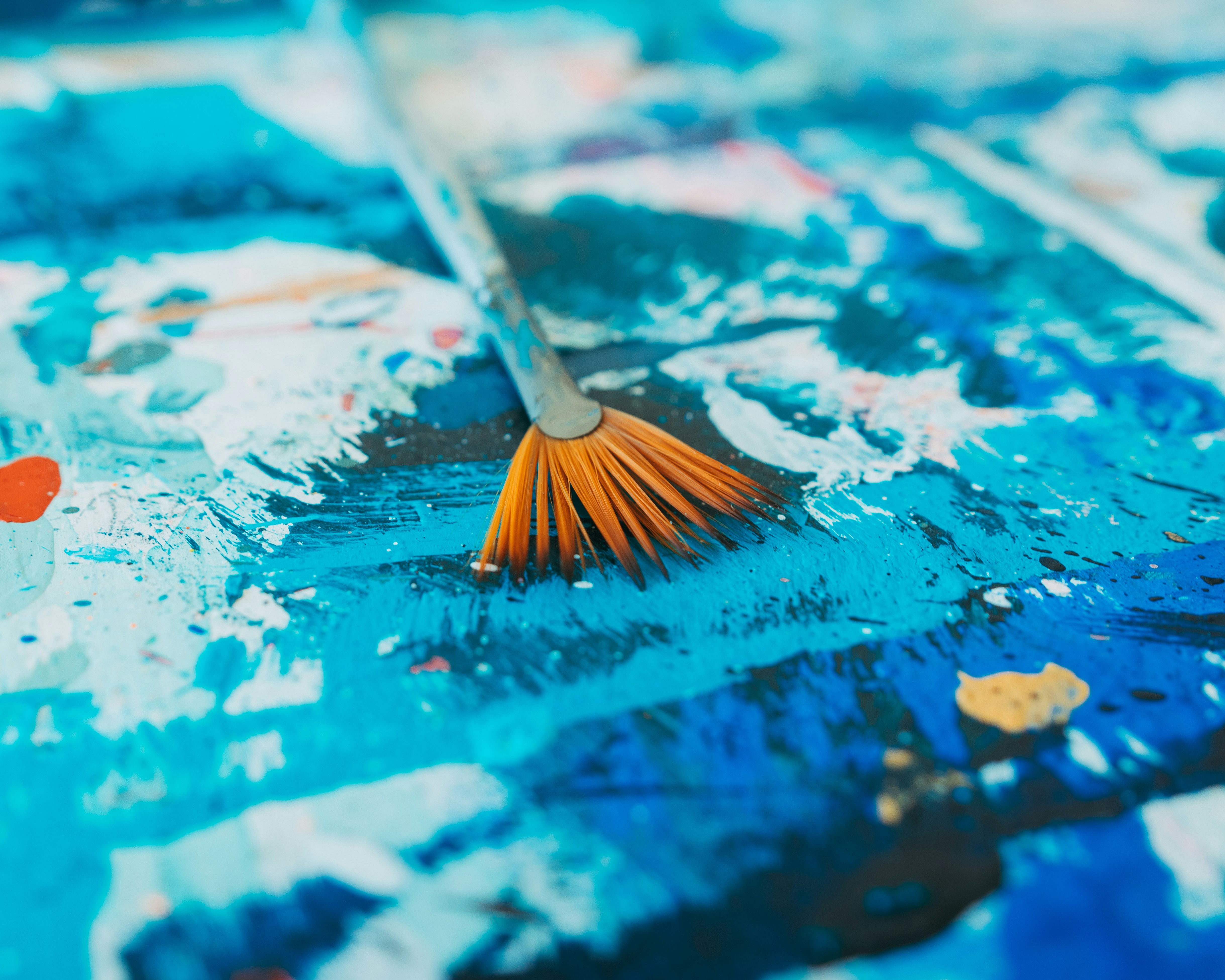 blue and white paint on a blue and white surface