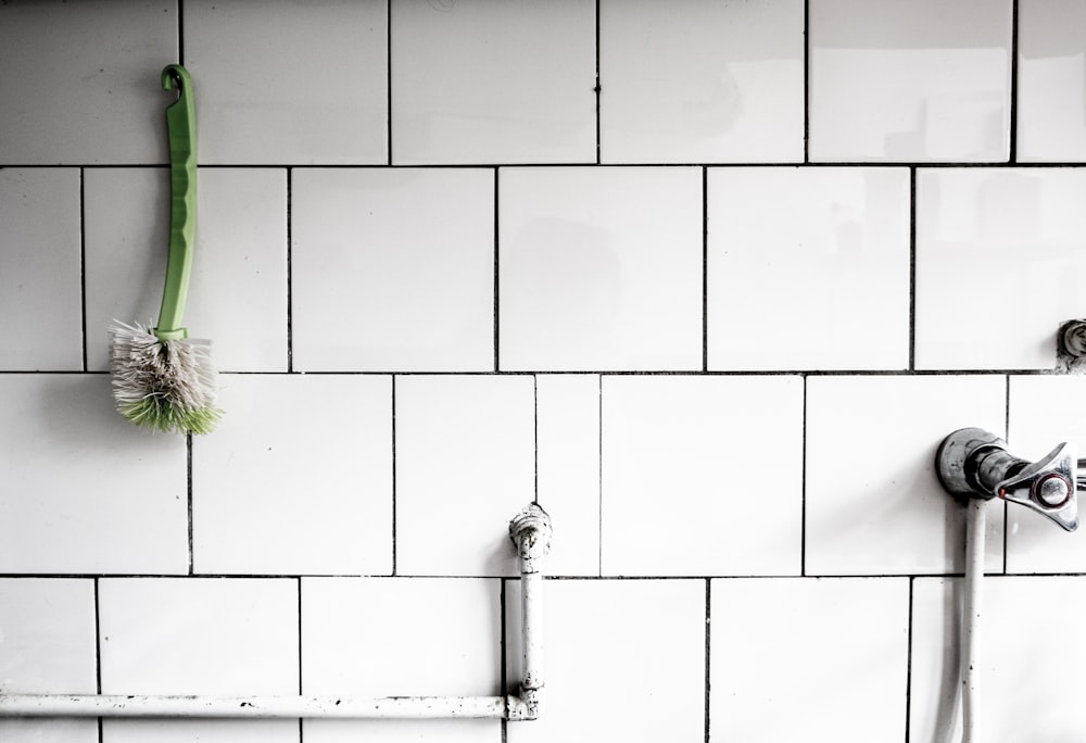 white ceramic tiles with green paint