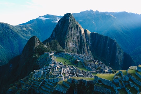 aerial view of city near mountain during daytime in Mountain Machu Picchu Peru