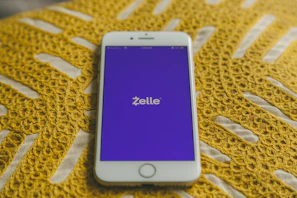 Sezzle logo showcased on a stylish mobile app interface.