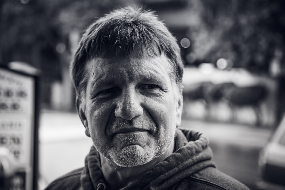 man in black jacket smiling