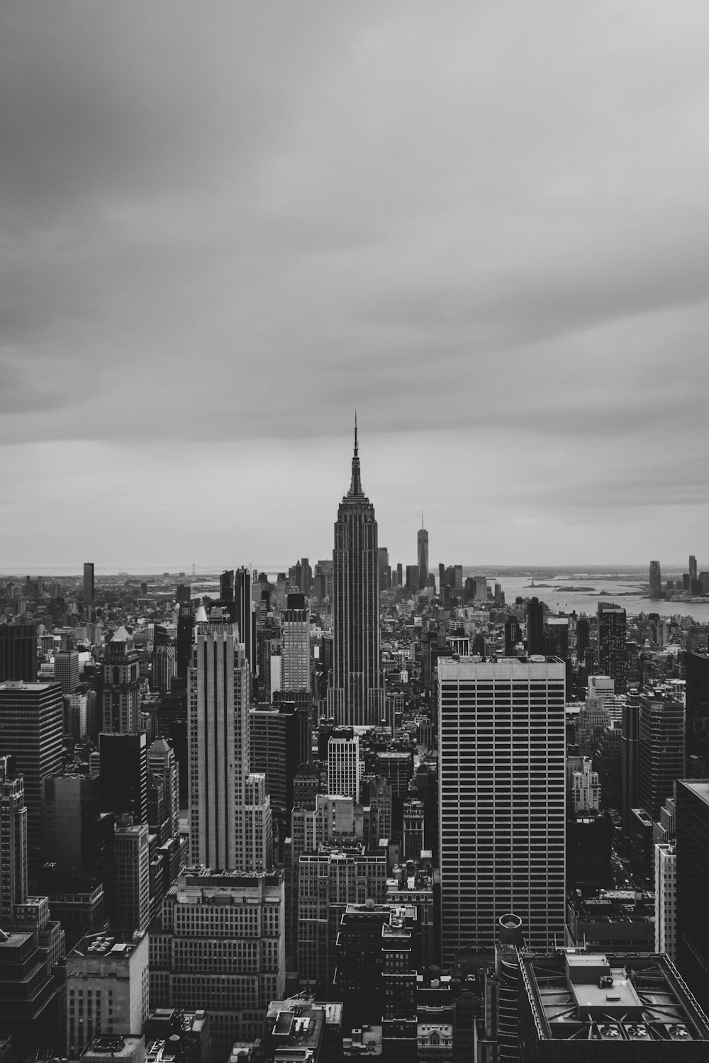 grayscale photo of city buildings