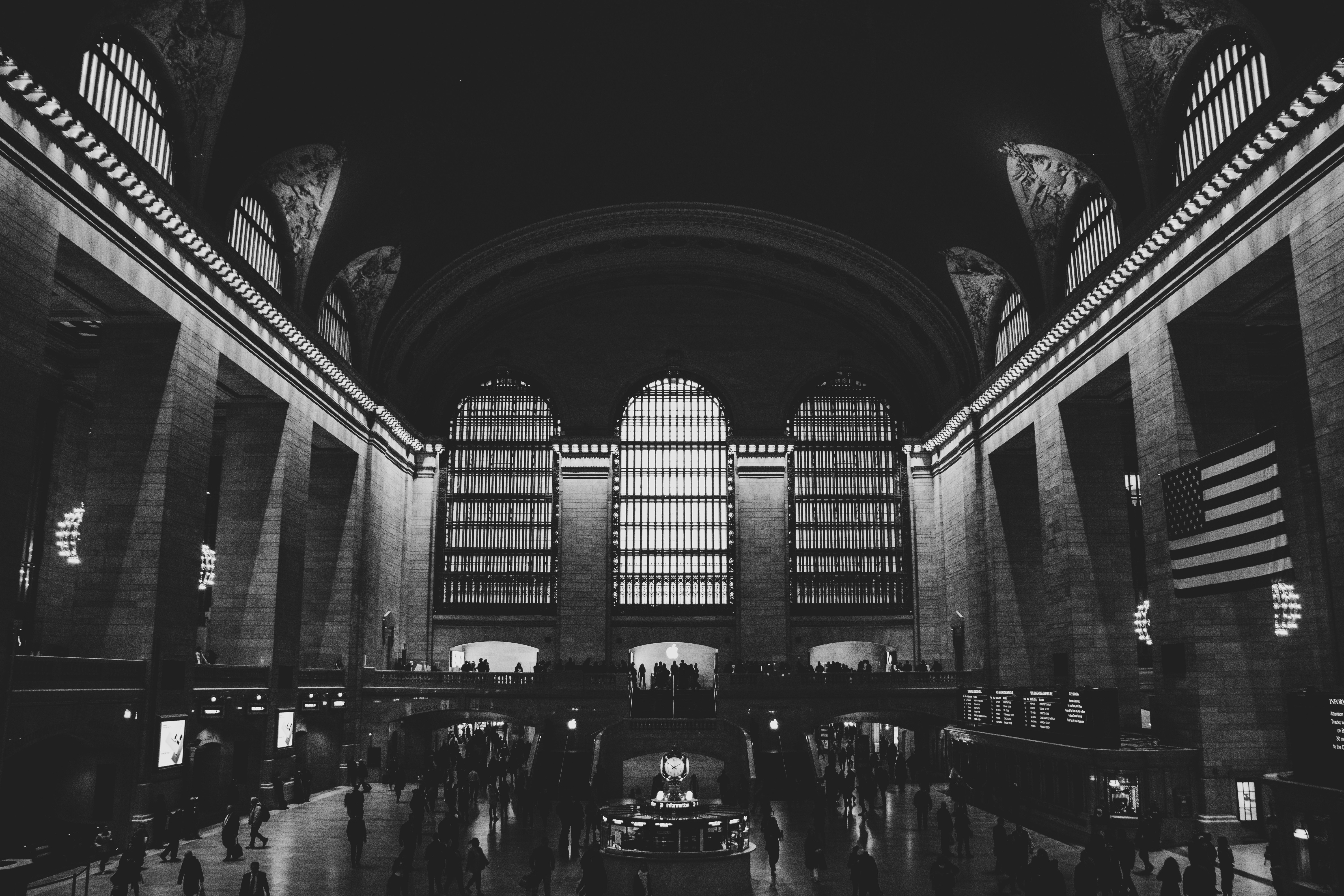 grayscale photo of people walking on street