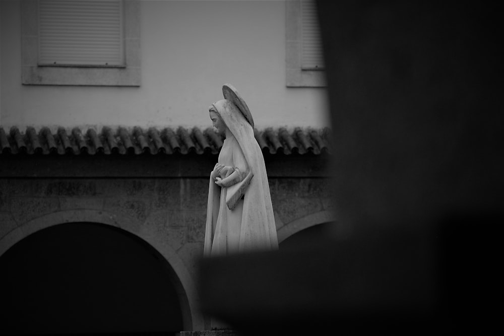 grayscale photo of angel statue