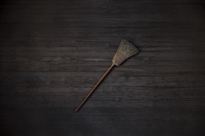 brown and black brush on brown wooden table