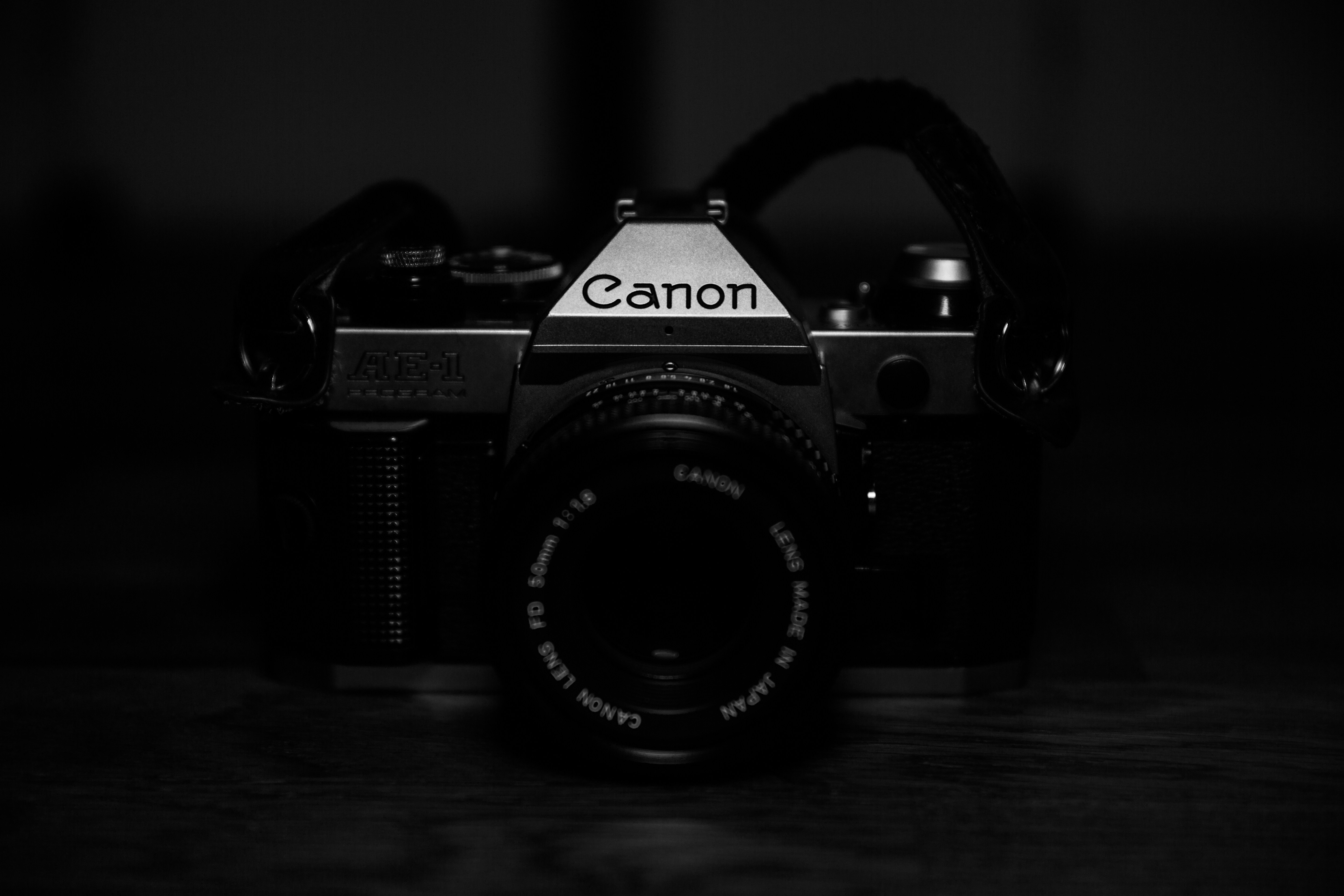 black and silver nikon dslr camera