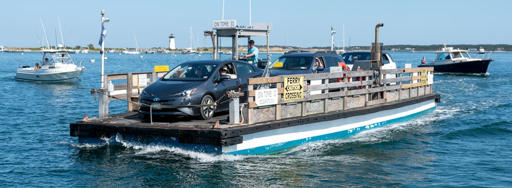 black sedan on brown wooden dock during daytime