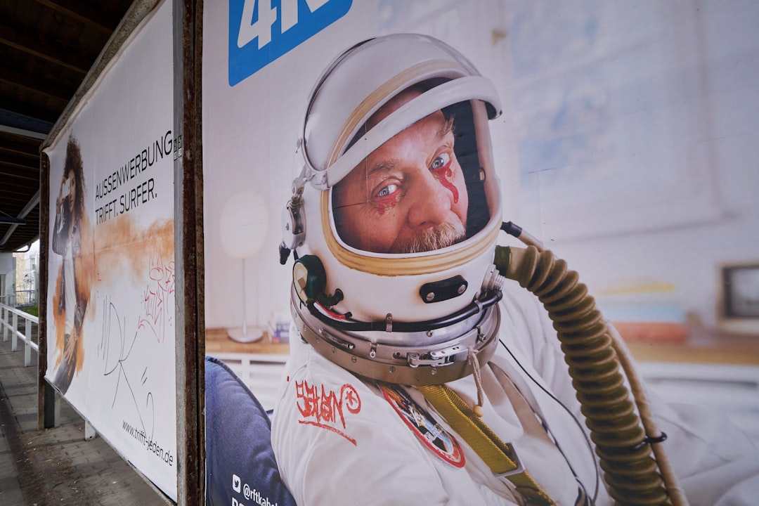 person wearing white and black helmet and white and red long sleeve shirt