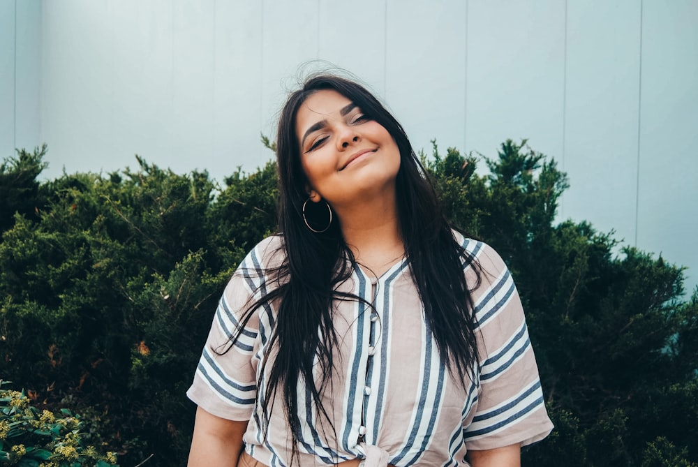 woman in black and white stripe shirt