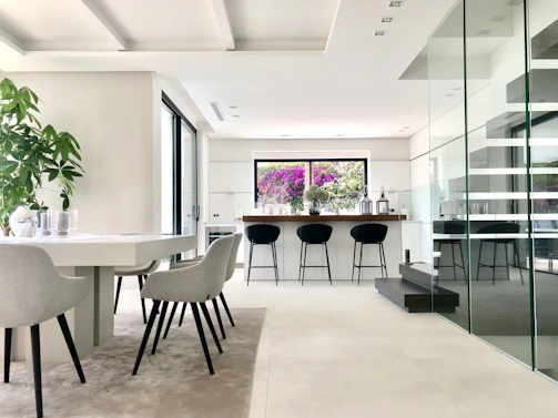 white and black dining table and chairs
