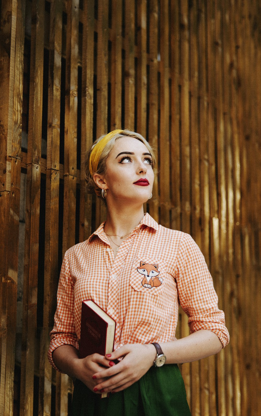 woman in red and white polka dot long sleeve shirt