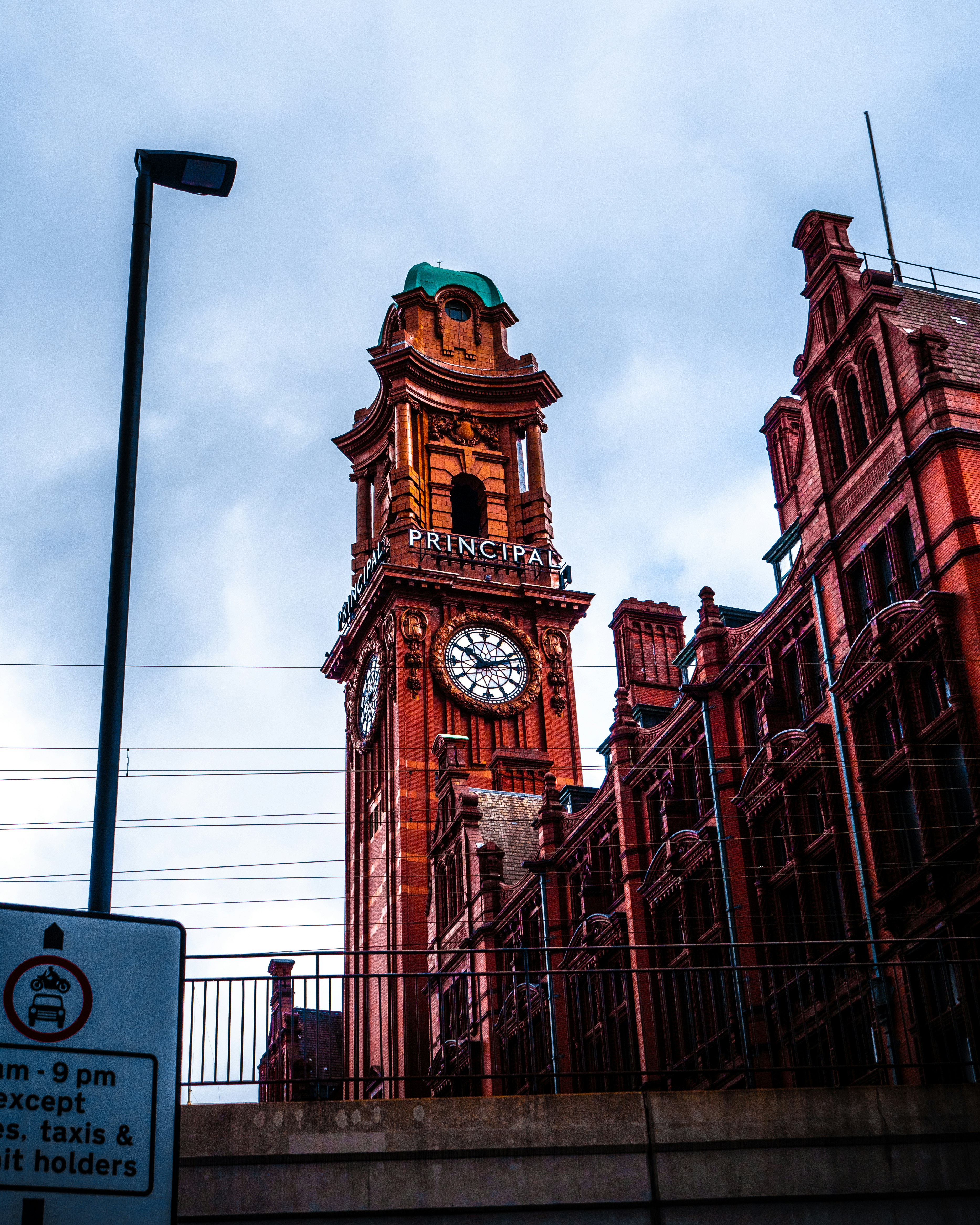 brown and white clock tower