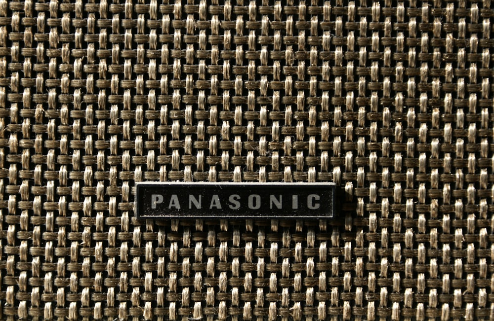 a black and white picture of a panasonic sign