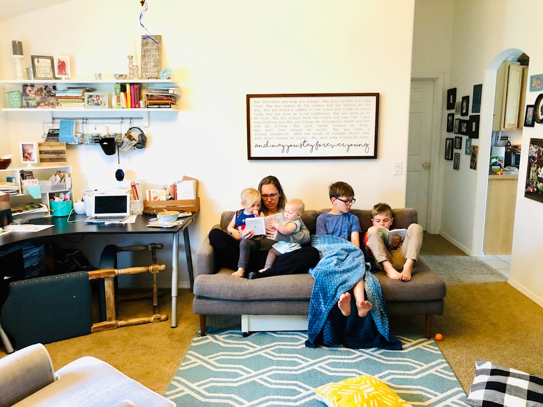 family relaxing in their living room - HVAC tune up service family relaxing in their living room - HVAC tune up service