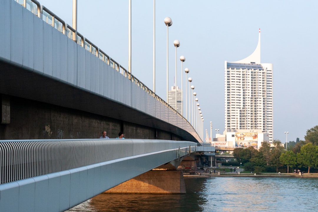 white bridge over river during daytime