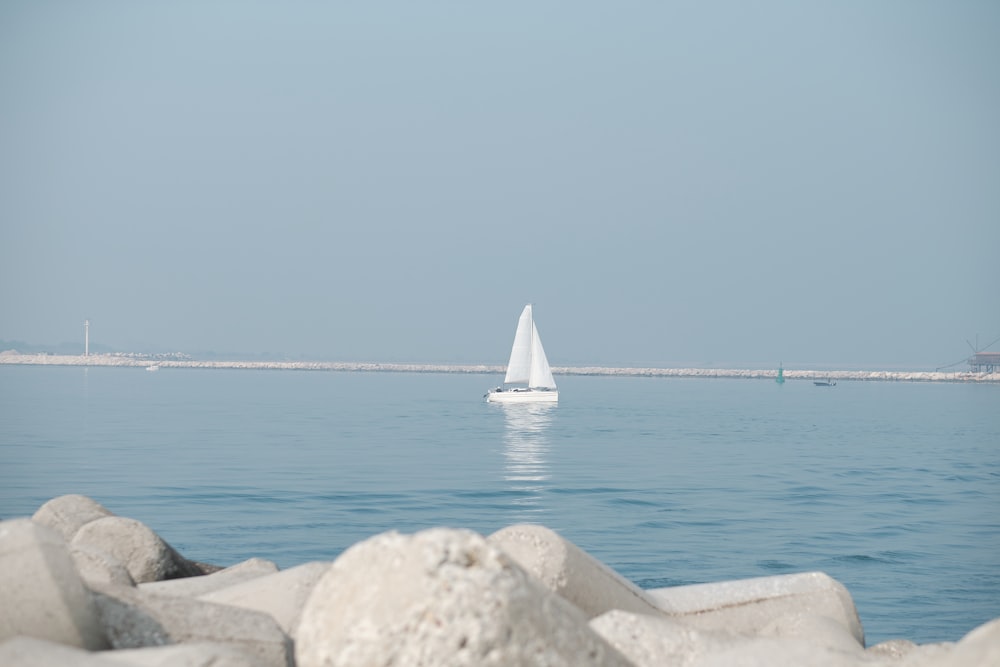 white sailboat on sea during daytime