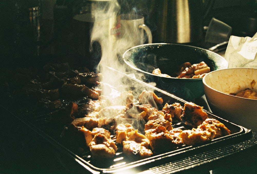 grilled meat on charcoal grill