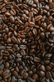 coffee beans on black surface