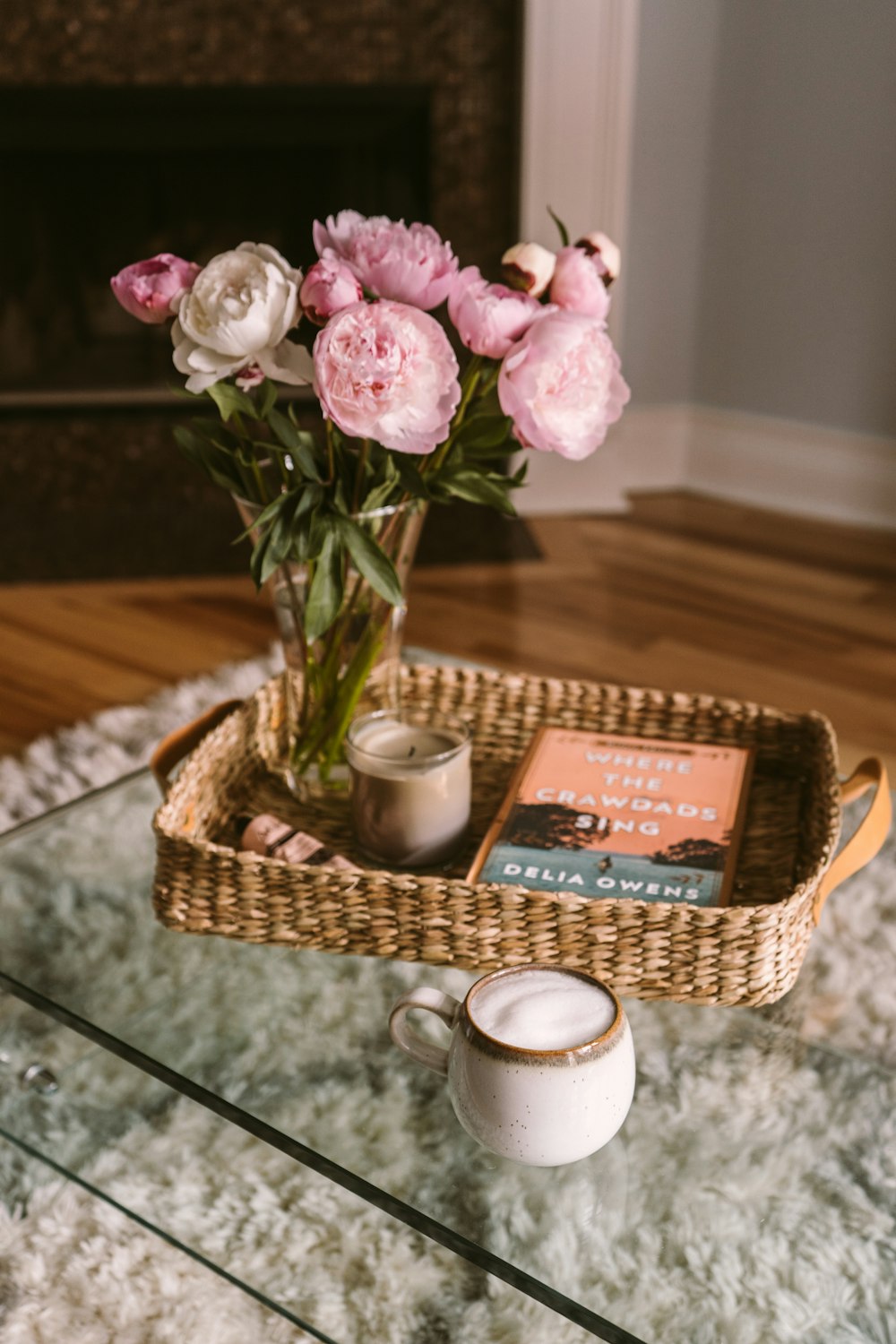 pink roses in brown woven basket