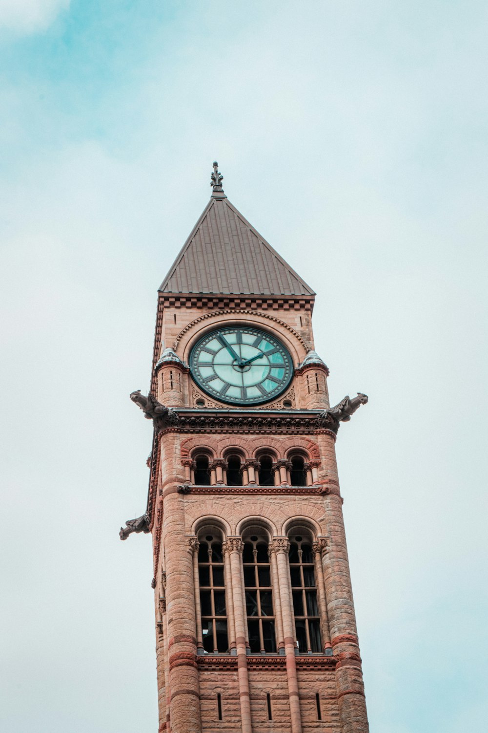 brown and green tower clock