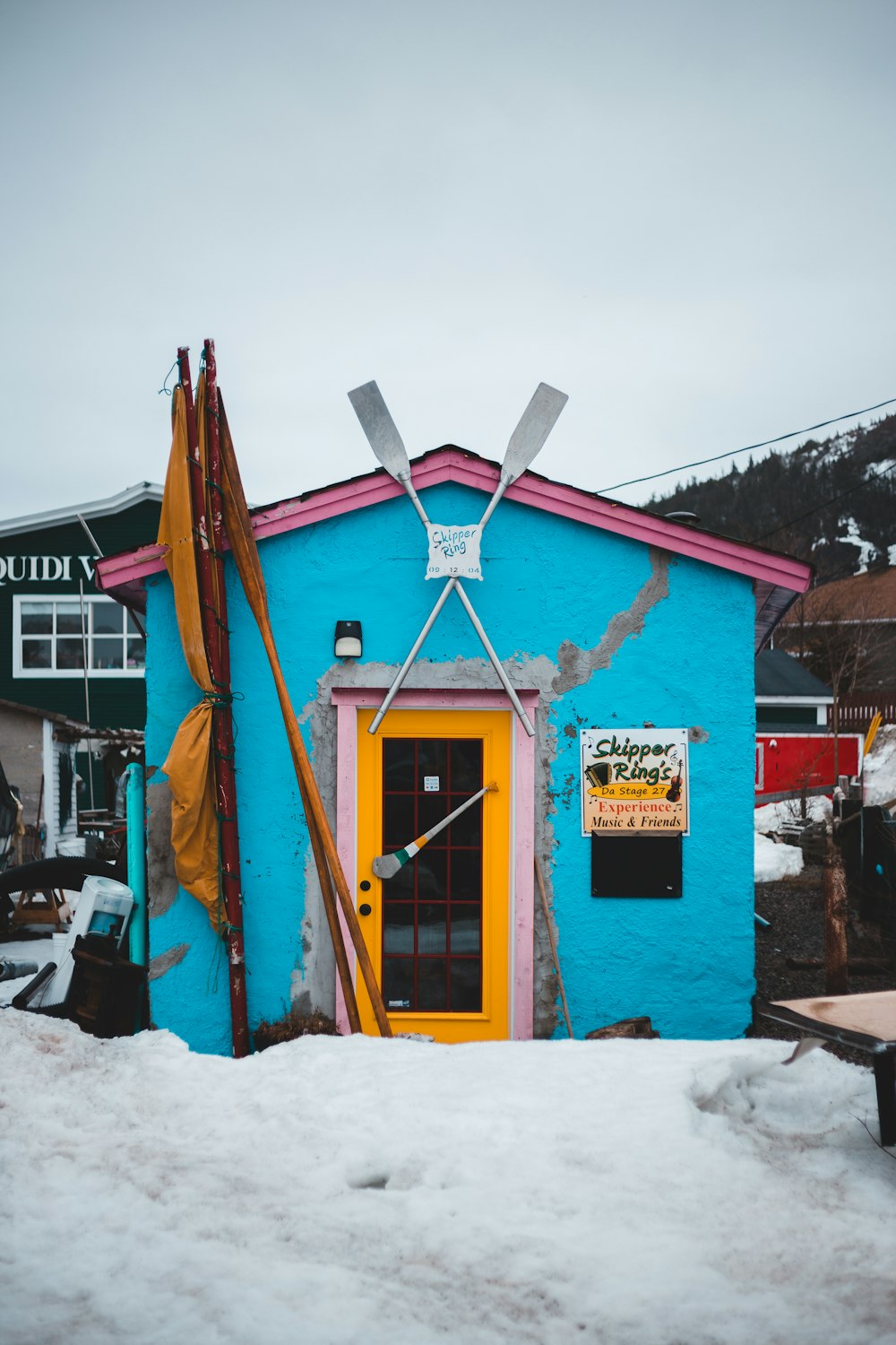 brown wooden house with white snow