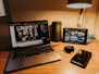 black and silver laptop computer on brown wooden table