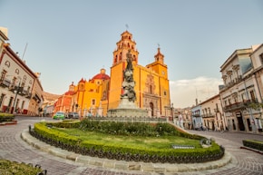 brown concrete building under blue sky during daytime