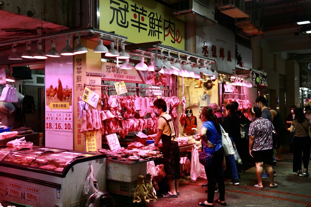 people standing in front of store during daytime