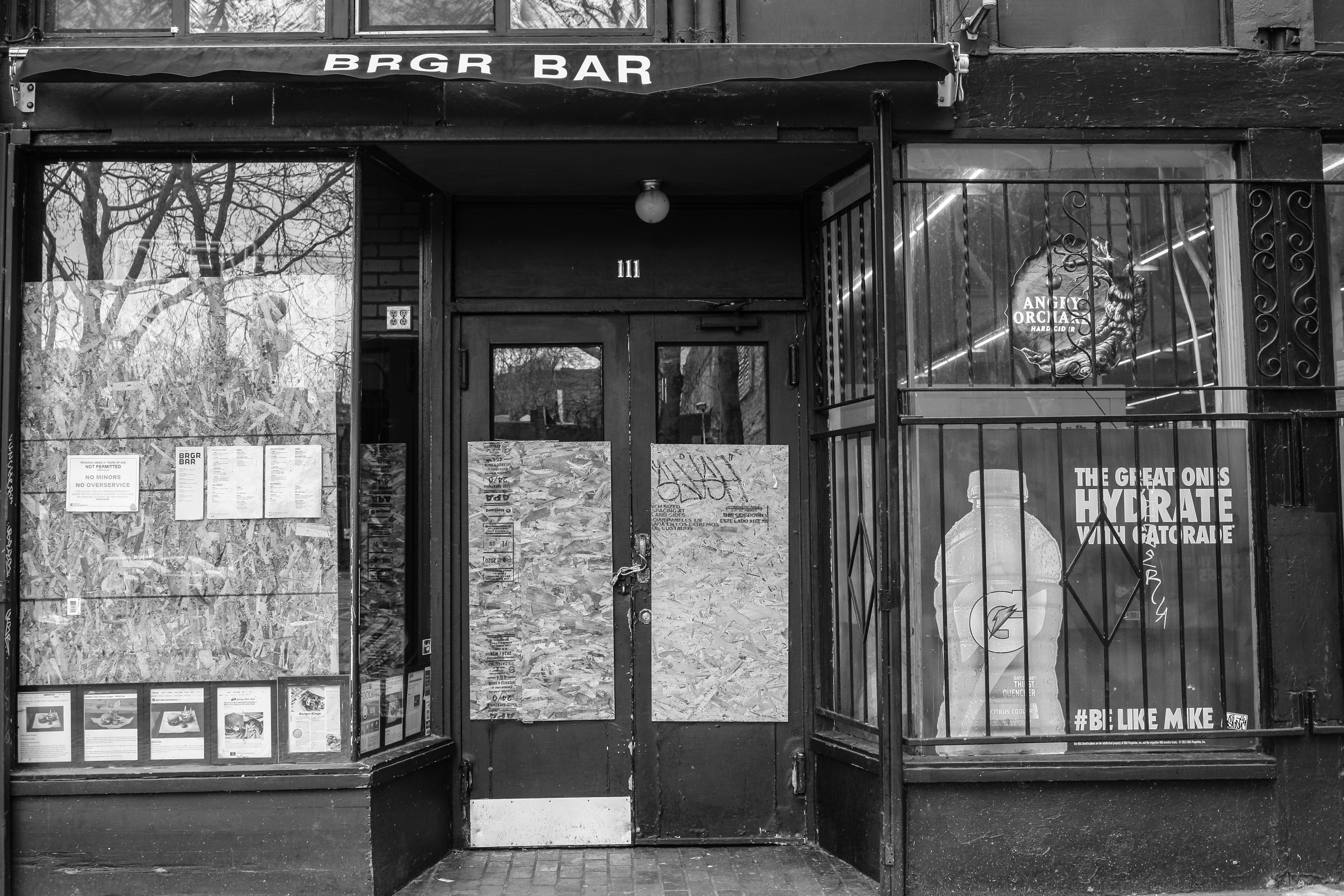 grayscale photo of a store