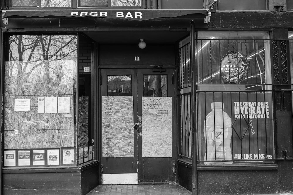 grayscale photo of a store