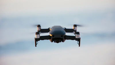 High-performance brushless fpv drone motor spinning against a blurred background.