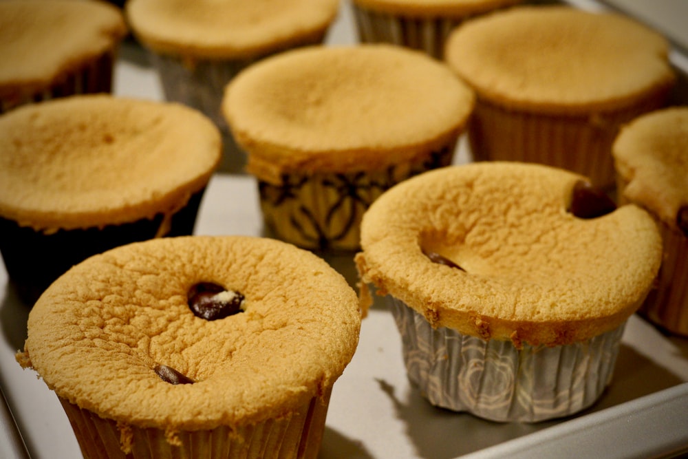 brown cupcake on white paper