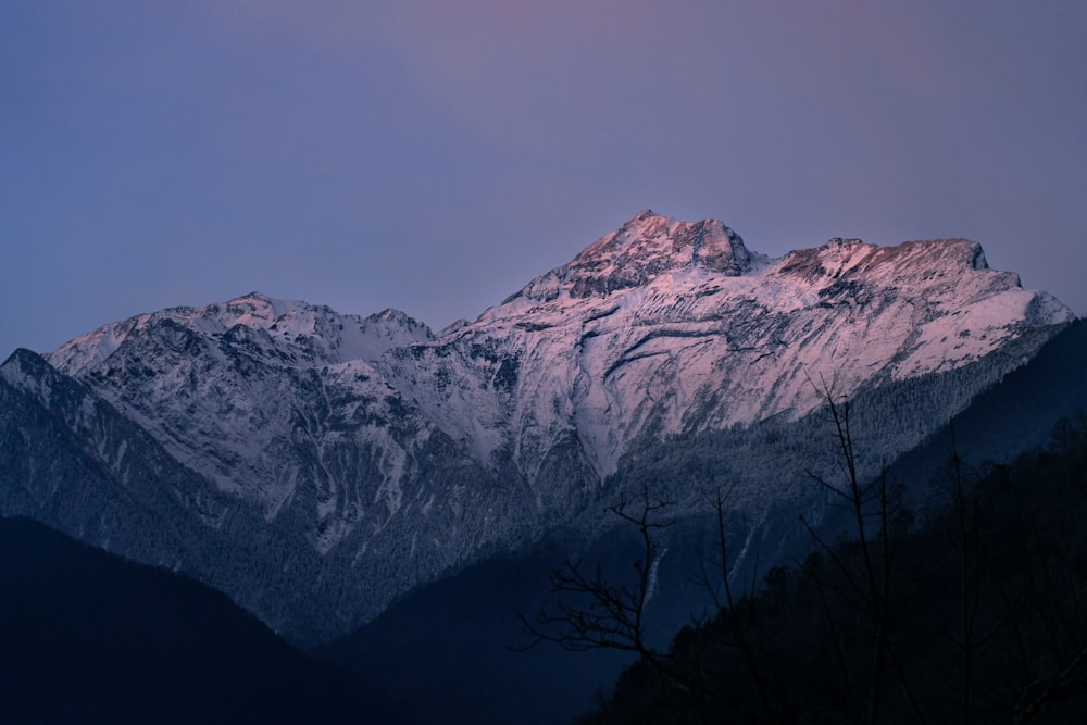 snow covered mountain during daytime