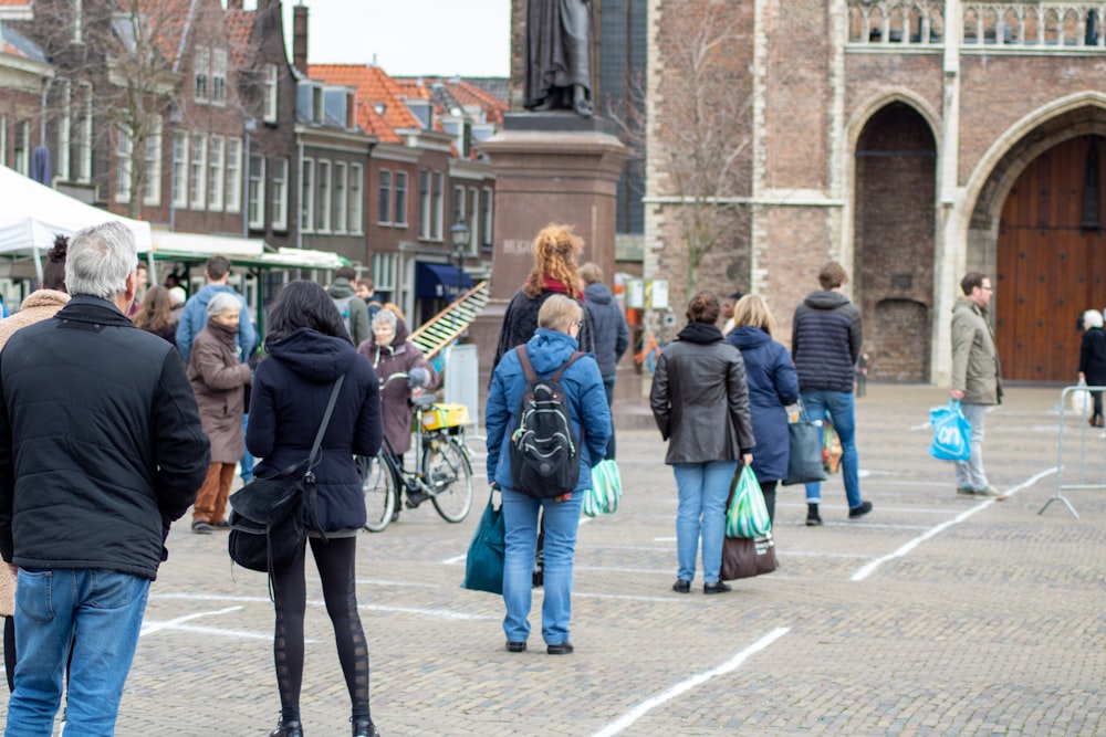 people walking on street during daytime