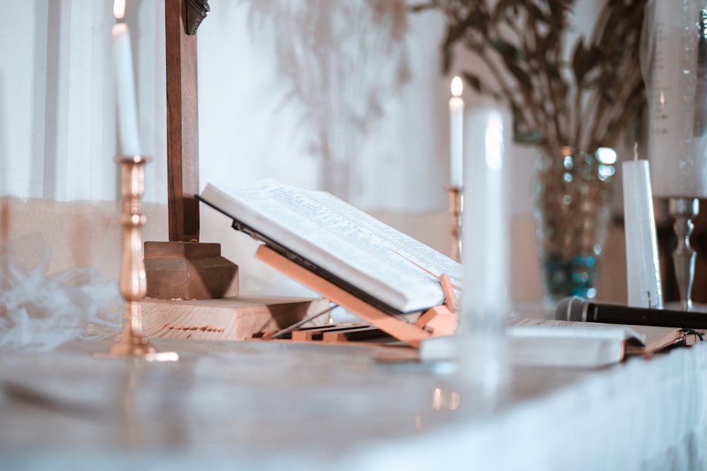 white book on brown wooden table