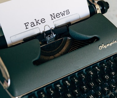 black and white typewriter on white table