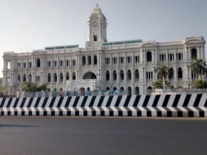 white concrete building under white sky during daytime