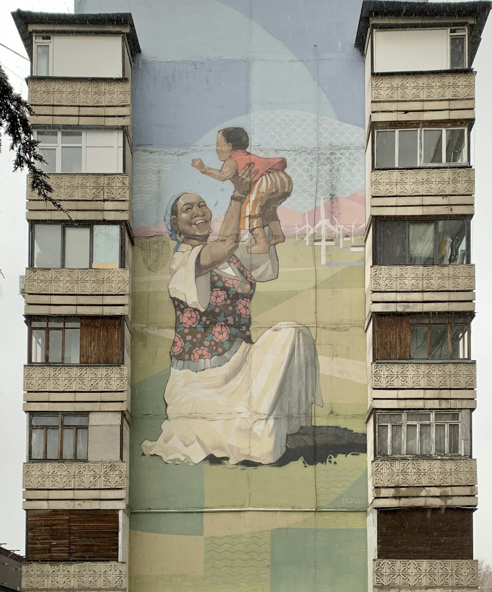 woman in white dress standing beside glass wall