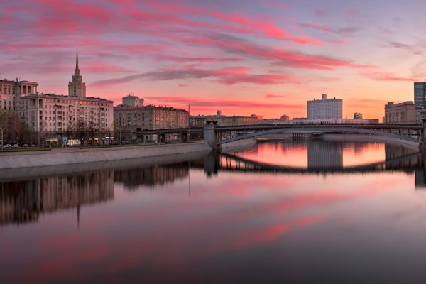 Body of water near city buildings during sunset — Moscow, Russia