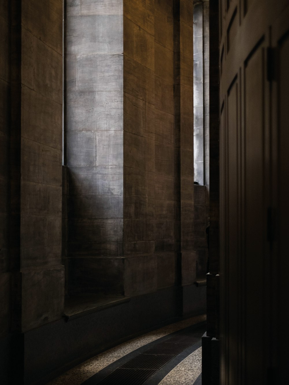 brown wooden framed glass door