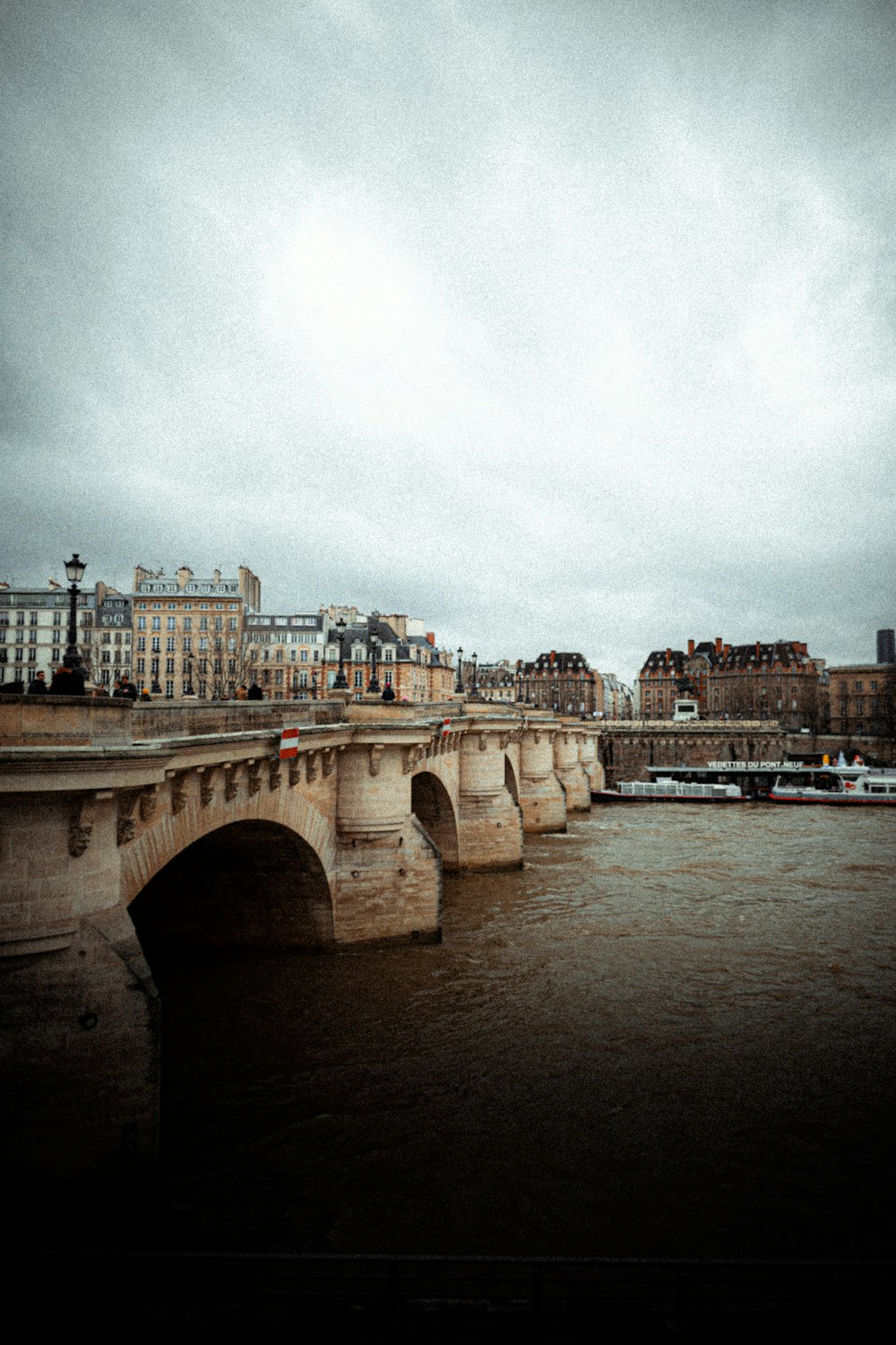 gray concrete bridge over river