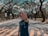 man in blue crew neck t-shirt standing on pedestrian lane during daytime