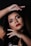 woman with red lipstick and black mascara