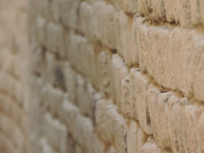 Close-up of freshly finished stone wall showcasing craftsmanship.