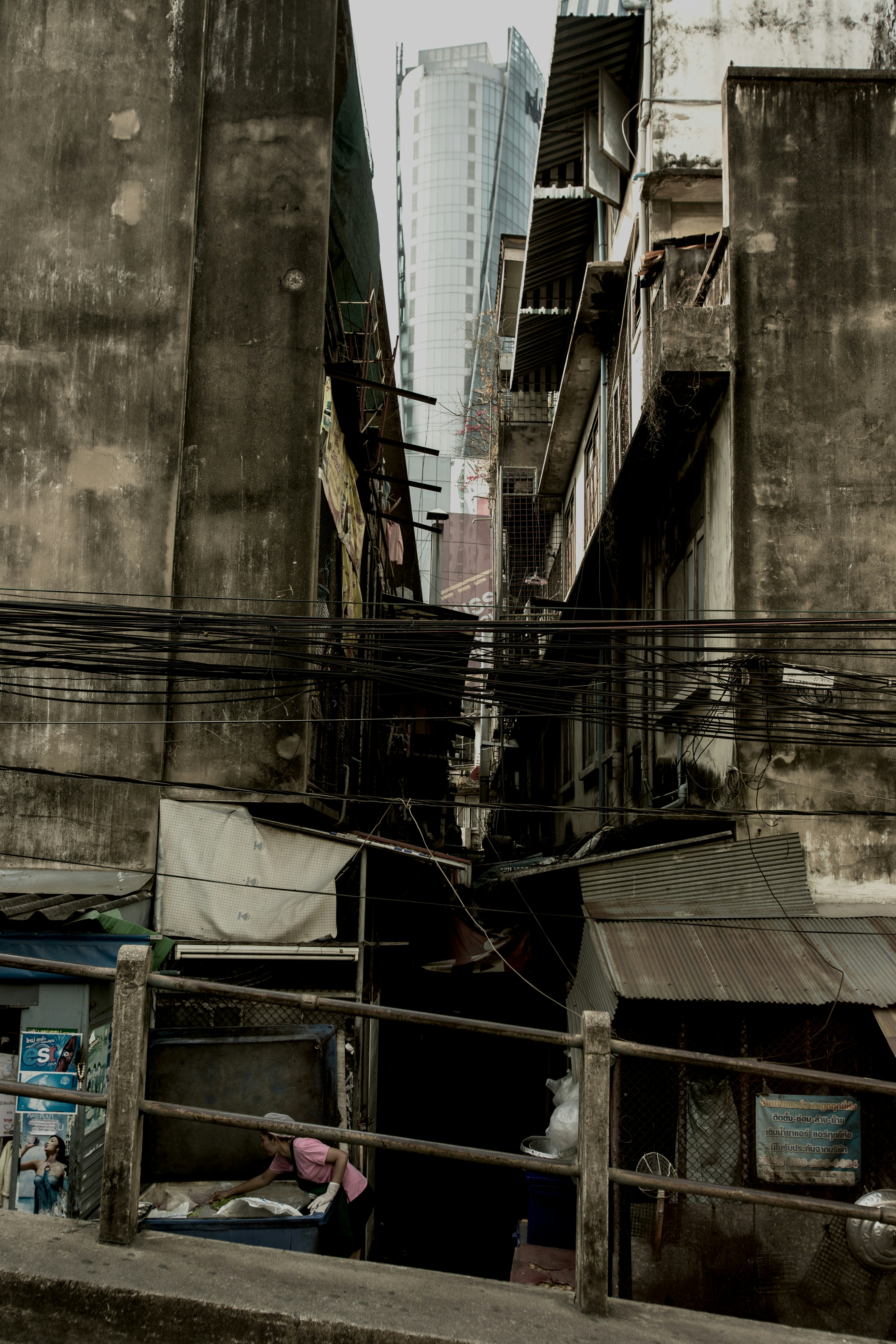 red metal pipe on brown concrete building