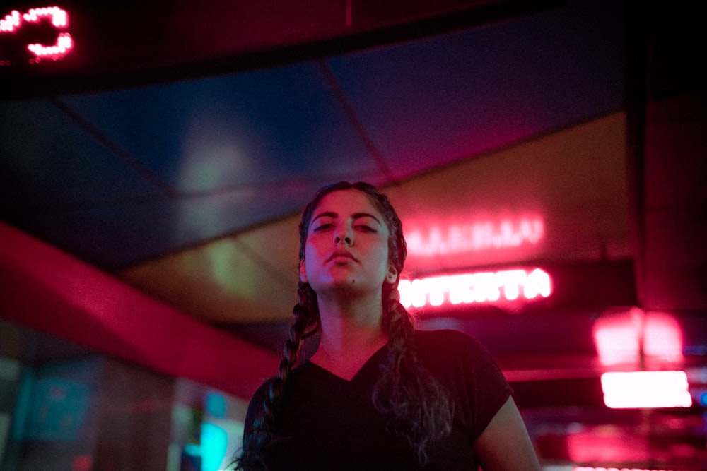 woman in black shirt standing